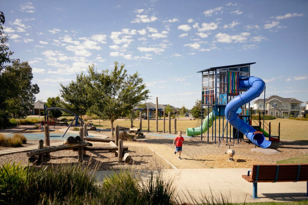 Young boy running in a playground