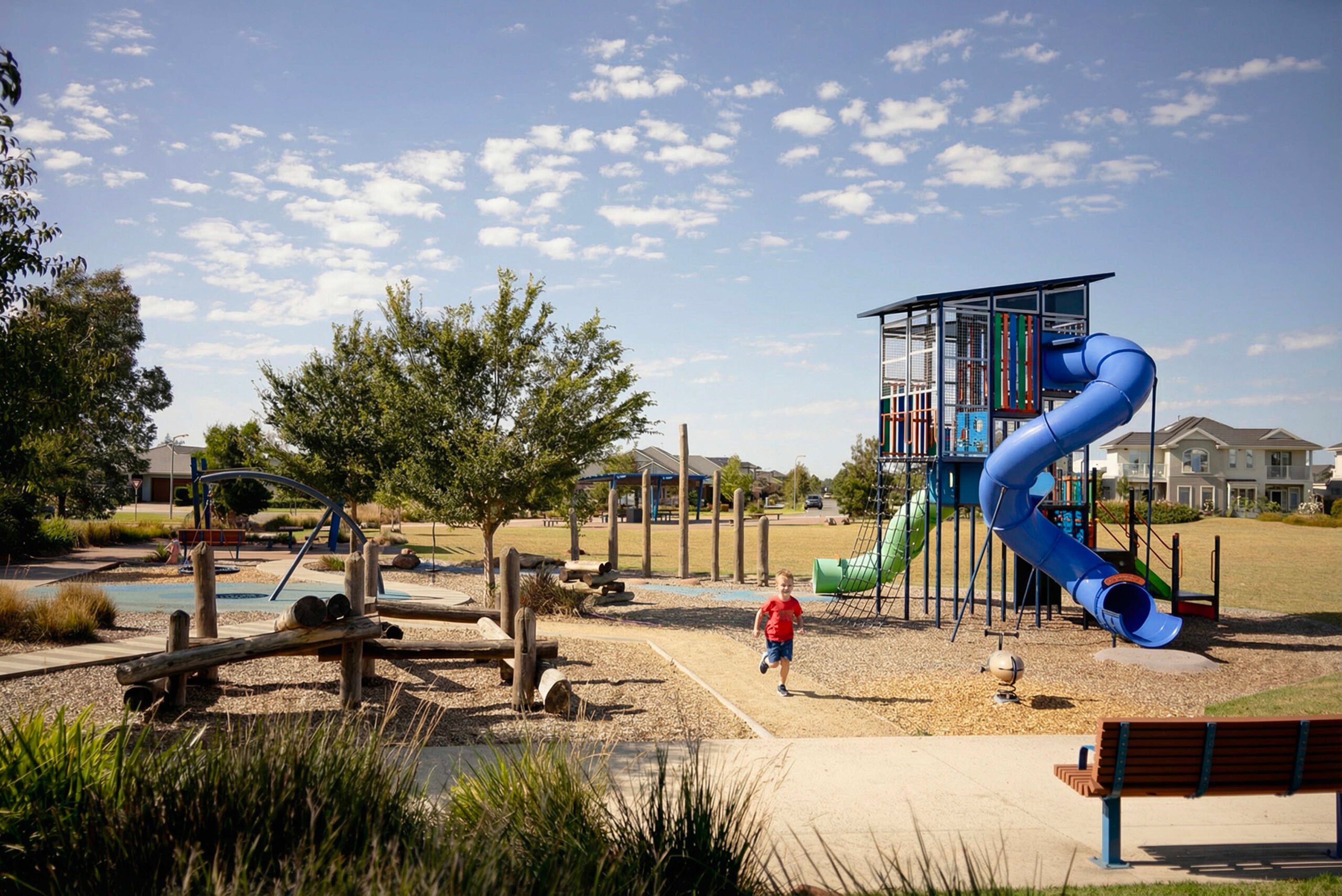 Young boy running in a playground